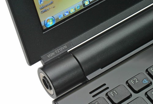 Close-up of Sony VAIO VGN-TZ12VN laptop hinge and keyboard.