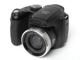 Fujifilm FinePix S5700 digital camera on white background.