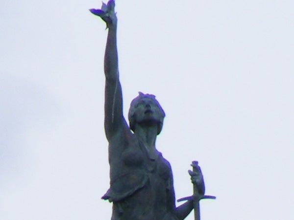 Statue captured with Fujifilm FinePix S5700 camera.