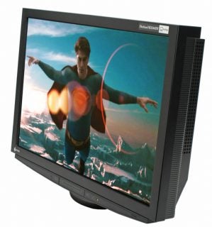 Eizo FlexScan HD2441W monitor displaying a superhero movie scene.
