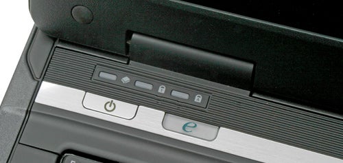 Close-up of Acer TravelMate 6292 laptop power button and indicators.