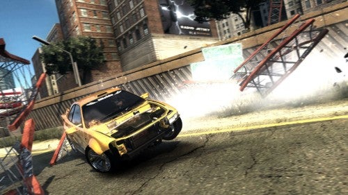 Car racing in urban environment in FlatOut: Ultimate Carnage game.