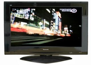 Panasonic Viera TH-42PZ700B plasma TV displaying night city scene.