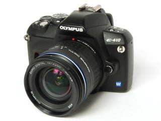 Olympus E-410 DSLR camera with lens on white background.