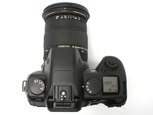 Sigma SD14 DSLR camera with 18-50mm lens from above.