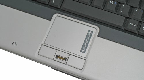 Close-up of NEC Versa S970 laptop's touchpad and fingerprint reader.