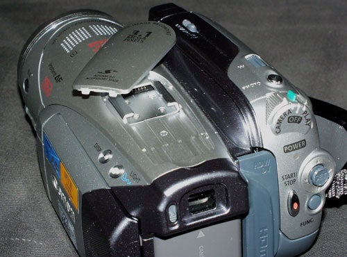 Canon HV20 HDV camcorder with tape compartment open.