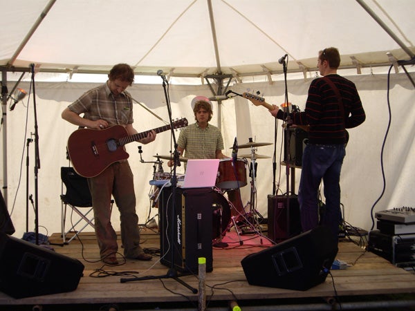 Band performing on stage at an event