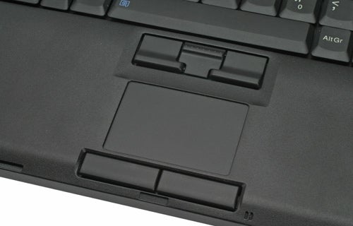 Close-up of Lenovo ThinkPad T61 laptop's keyboard and trackpad.
