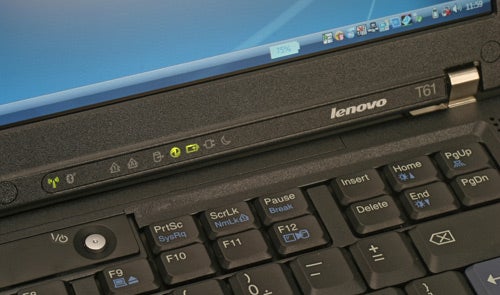 Close-up of Lenovo ThinkPad T61 laptop keyboard and screen.