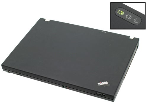 Lenovo ThinkPad T61 laptop closed with power button detail.