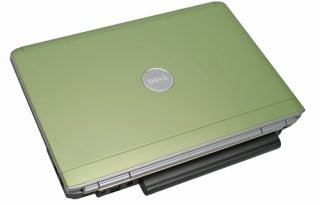 Dell Inspiron 1520 laptop with green lid closed.