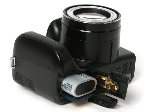 Kodak EasyShare Z712 IS camera with open battery compartment