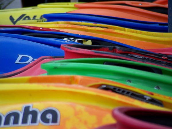 Colorful kayaks in a row taken with Kodak EasyShare Z712 IS.