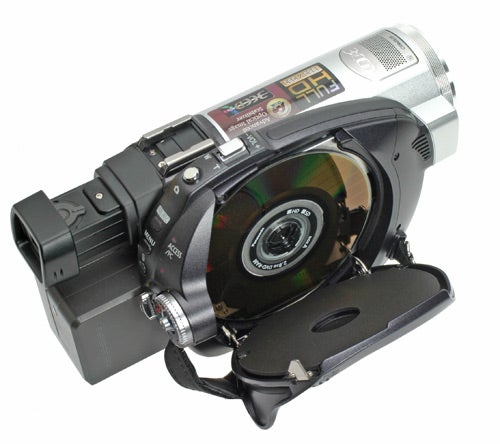 Panasonic HDC-SX5 camcorder with open disc compartment.