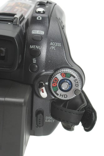 Close-up of Panasonic HDC-SX5 camcorder's control buttons.