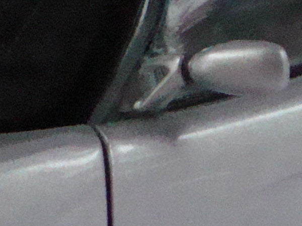 Close-up of Sony Cyber-shot DSC-W200 camera's corner detail.