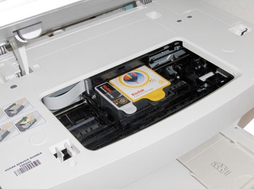 Kodak EasyShare 5500 printer with open ink cartridge compartment.