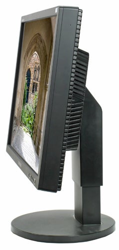 Samsung SyncMaster 245B 24-inch monitor displaying on stand.