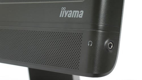 Close-up of Iiyama ProLite B2403WS monitor's lower bezel and speaker grill.