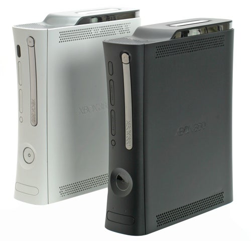 Microsoft Xbox 360 Elite and white Xbox 360 consoles side by side.