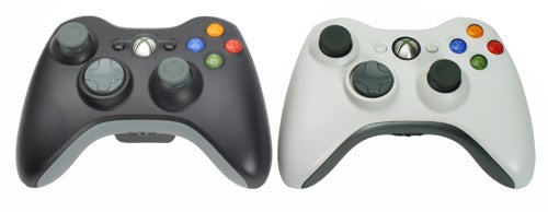 Black and white Xbox 360 Elite controllers side by side.