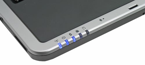 Close-up of Zepto Znote 6224W laptop's edge with indicator lights.