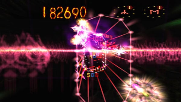 Screenshot of Space Giraffe gameplay showing score and effects.