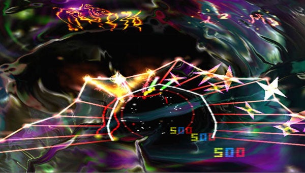 Vibrant and psychedelic gameplay screenshot from Space Giraffe.