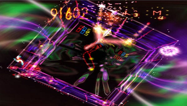 Vibrant screenshot of Space Giraffe video game action.