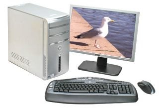 Dell Inspiron 530 desktop computer with monitor, keyboard, and mouse.