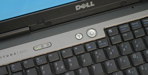 Close-up of Dell Latitude D531 laptop keyboard and power buttons.