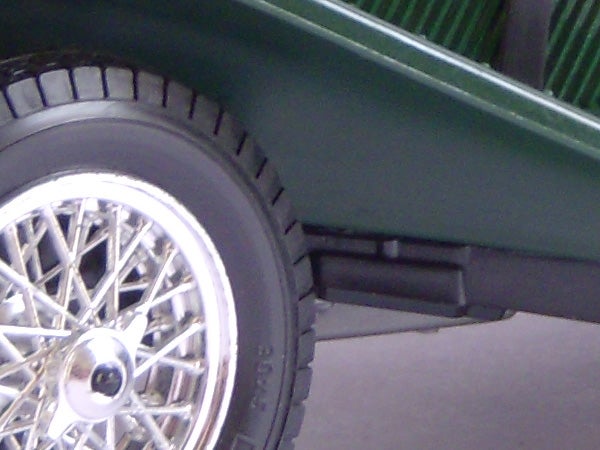 Close-up of a car wheel with shiny spokes