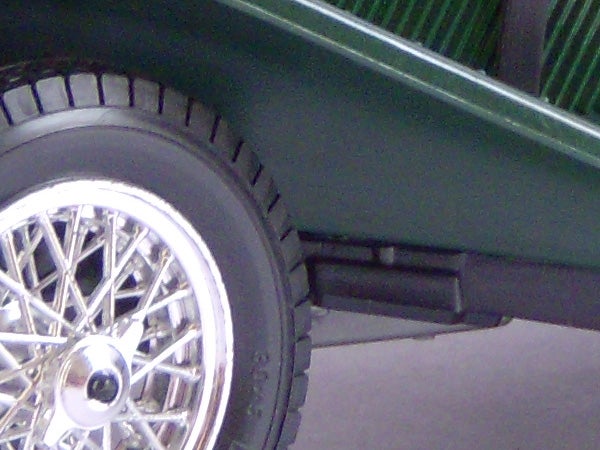 Close-up of a car wheel with a chrome rim