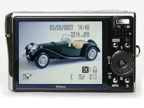 Nikon CoolPix S50c camera displaying a vintage car photo.