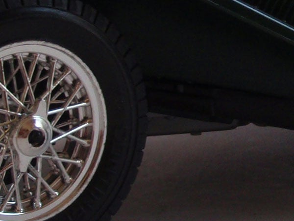 Close-up of vintage car wheel and tire