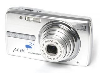Olympus mju 760 silver digital camera on white background.