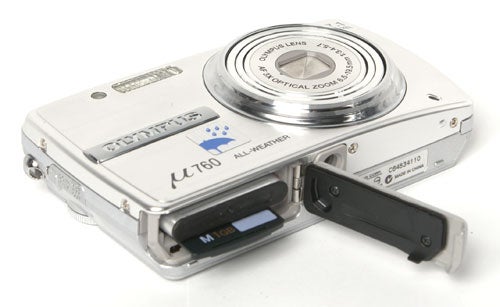 Olympus mju 760 camera with open battery compartment.