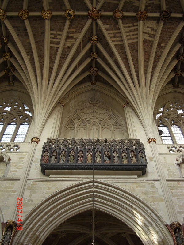 Gothic church ceiling and ornate sculpture detail.