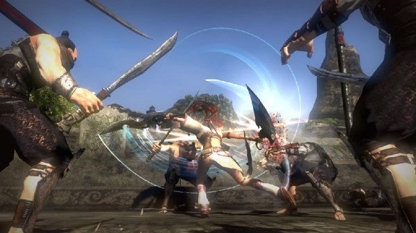 Heavenly Sword gameplay showing character fighting multiple enemies.