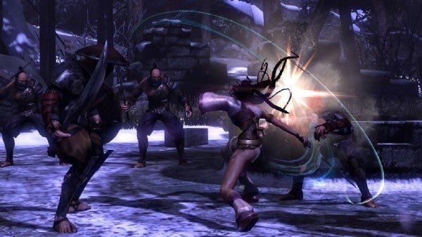 Heavenly Sword gameplay showing character fighting enemies.