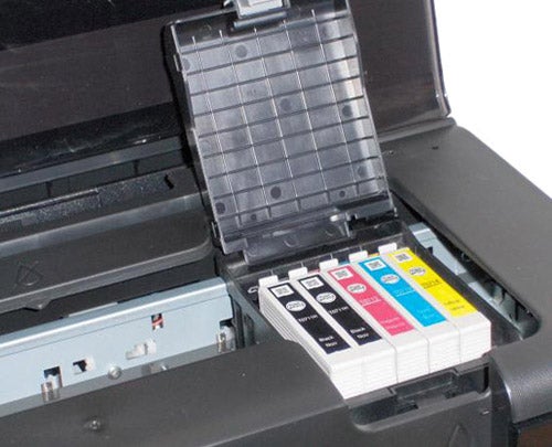 Epson Stylus D120 printer with open ink cartridge compartment.