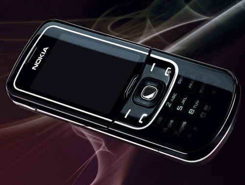 Nokia 8600 Luna phone with sliding cover on smoky background.