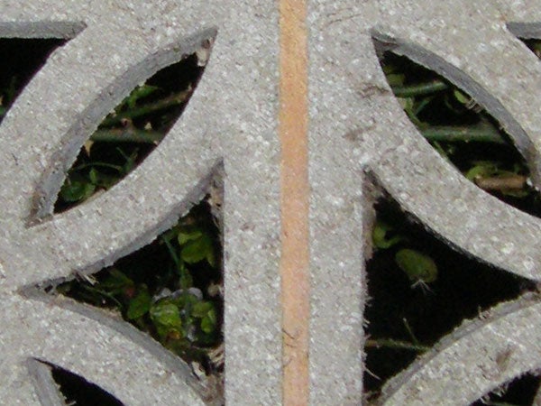 Close-up photo of a decorative metal grate.