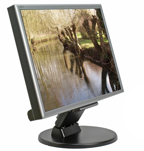 NEC MultiSync LCD225WXM monitor displaying a landscape image.