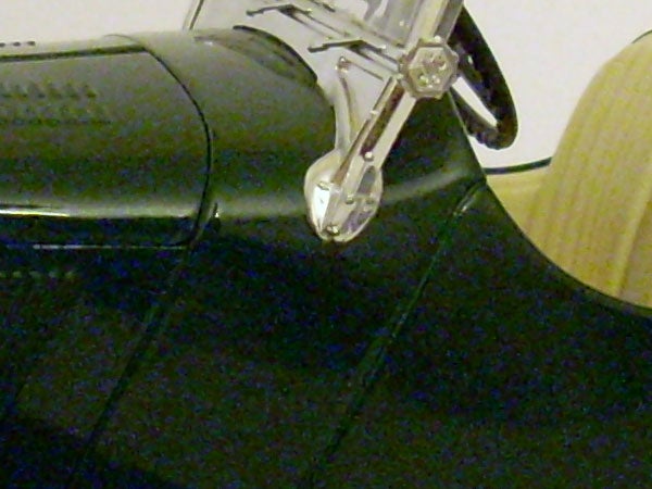 Close-up of a sunglass arm and hinge.