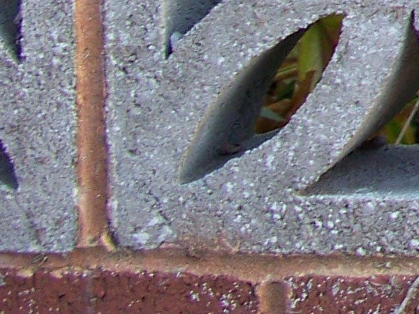Close-up photo showing the texture and details of a metallic surface.