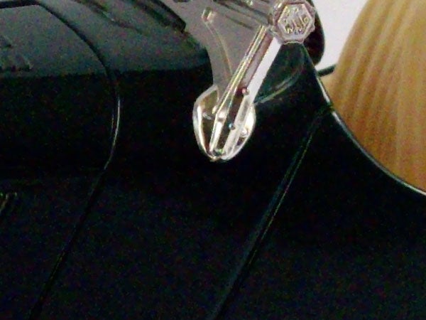 Close-up of Pentax Optio E40 camera's strap hook.