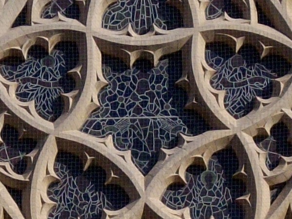 Close-up of architectural stone tracery details.