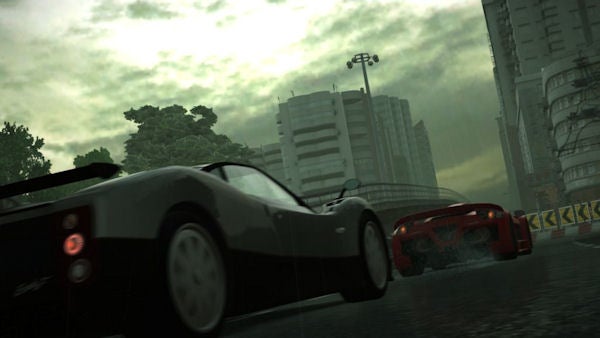 Screenshot of rainy race scene in Project Gotham Racing 4 video game.